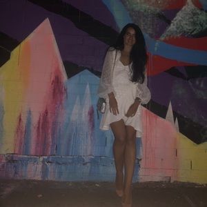 Sheer polka dot long sleeve wrap dress